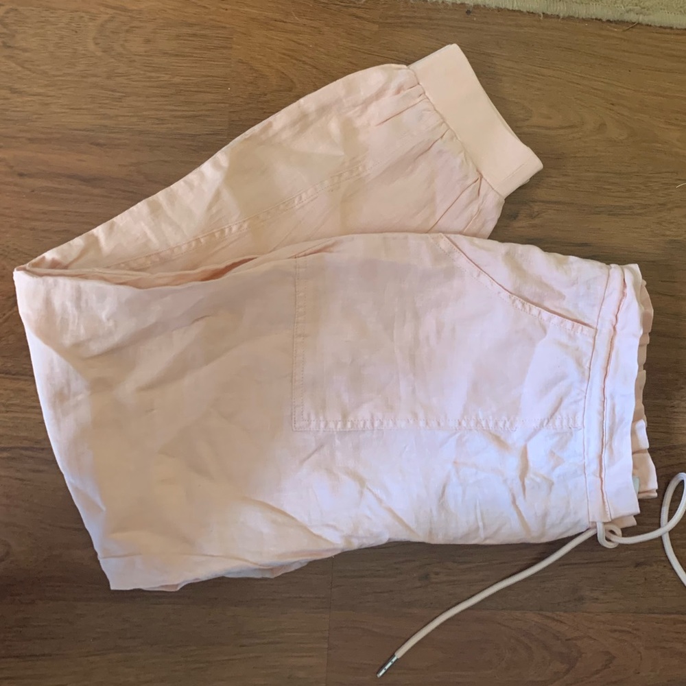 medium guess joggers! Super light and would be perfect for the beach